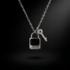 Collier en argent 925 rhodié avec pendentif cadenas émail noir et petite clé pavée de zircons, Scoobijou Maroc.