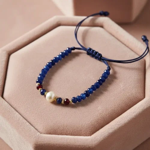 Bracelet artisanal avec perle baroque, pierres rouges et noires